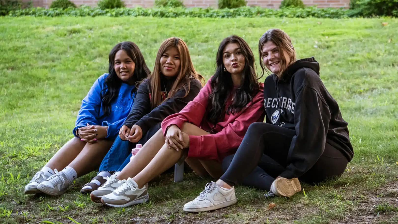 Grace students smiling bonfire