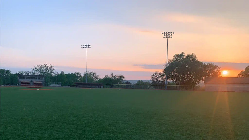 baseball field at sunset