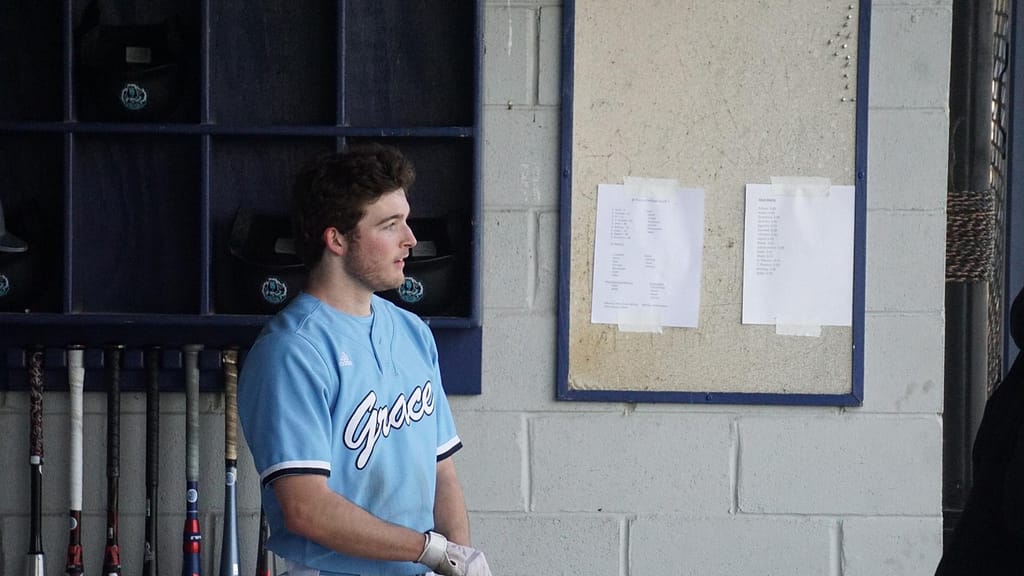 baseball player in dugout