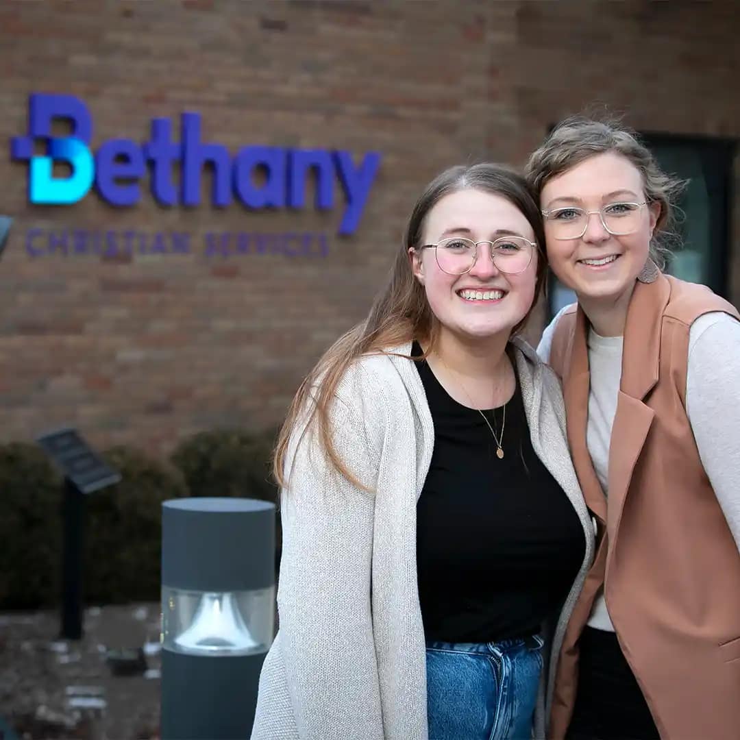 MinistryWork-alumnistory students taking photo outside