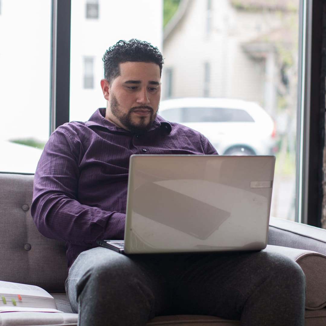 Grace student working on a laptop