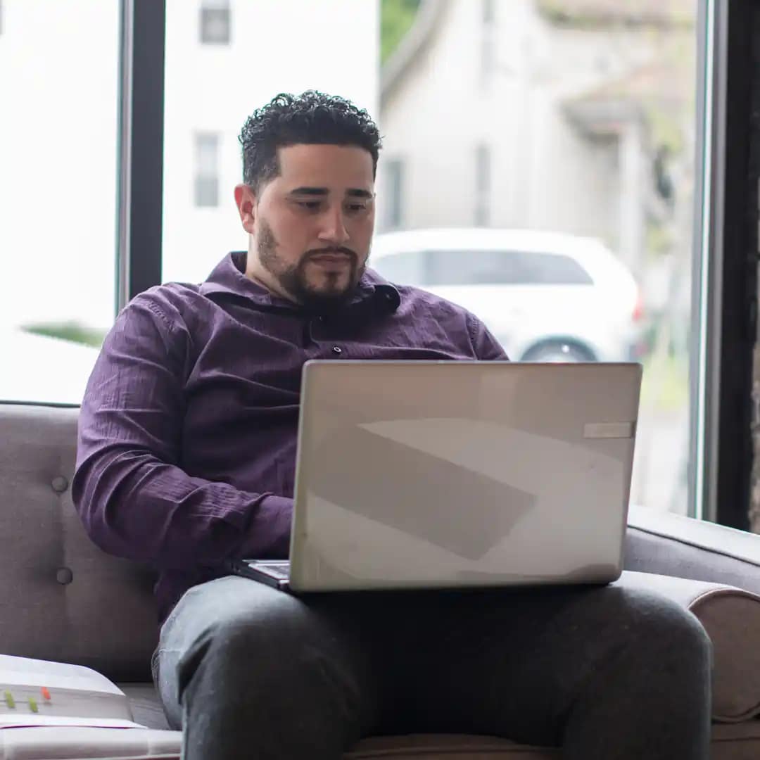 Grace student working on a laptop