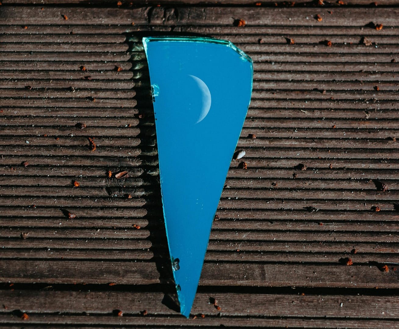moon-reflecting-on-broken-glass