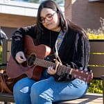 Rachel Playing Guitar