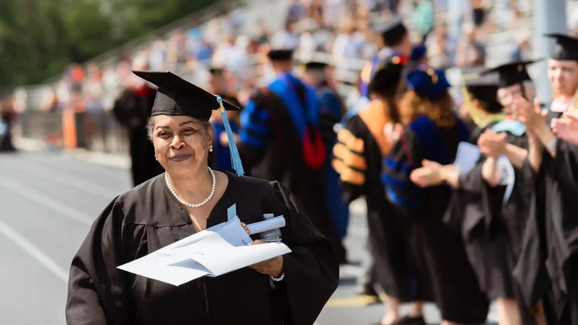 Grace Christian University 2021 commencement. 6-edit students in caps and gowns
