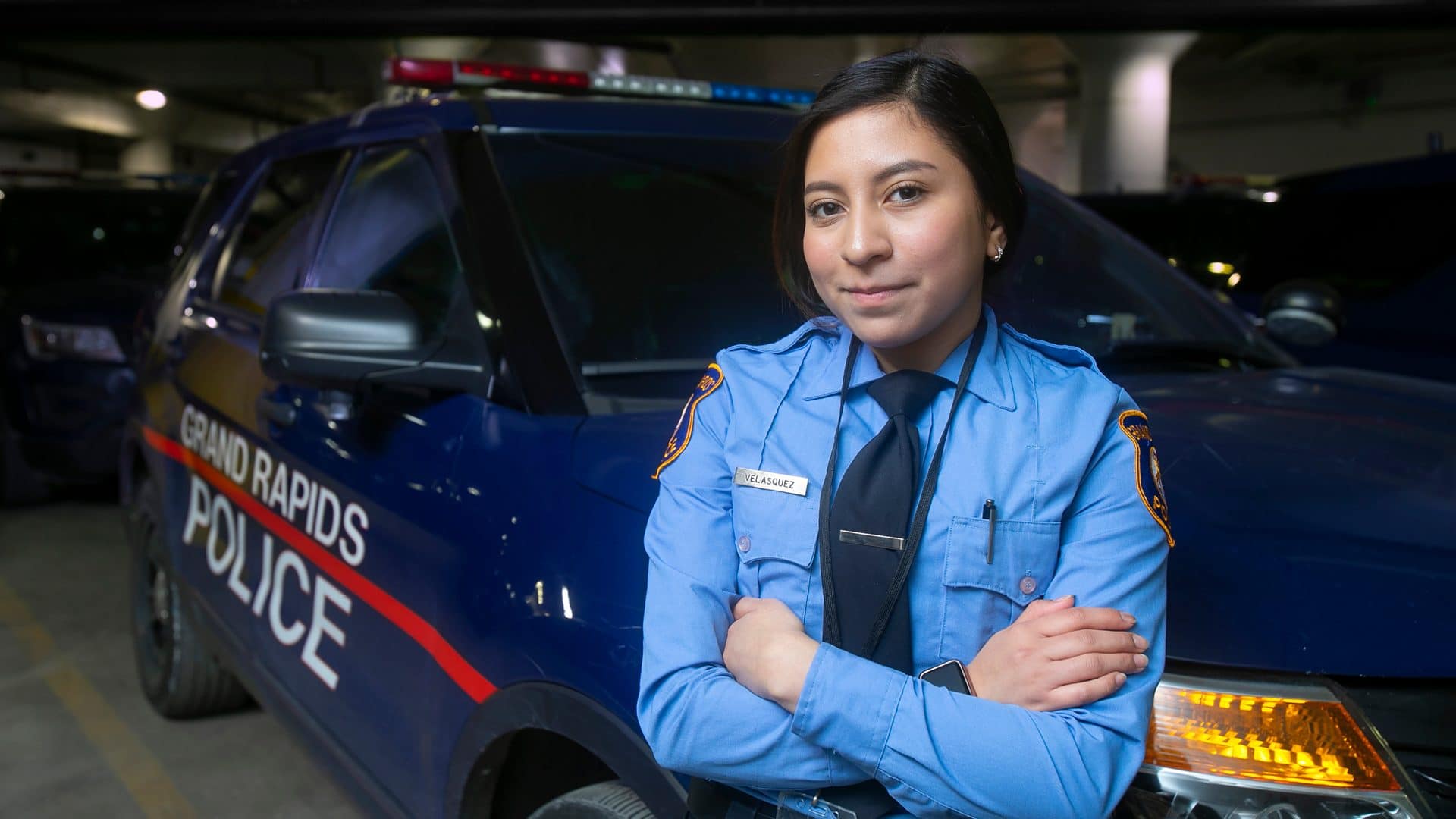 Journey-article-headers6 police officer in front of cruiser