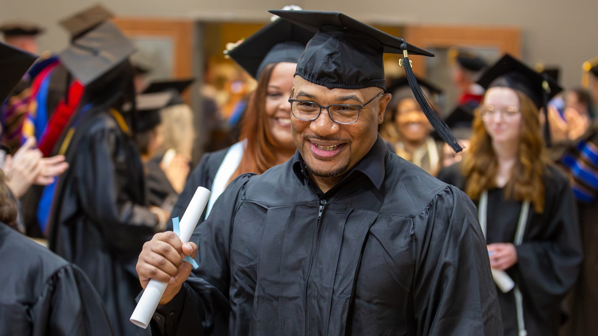 Grace-Alumni-Discount new grad at commencement