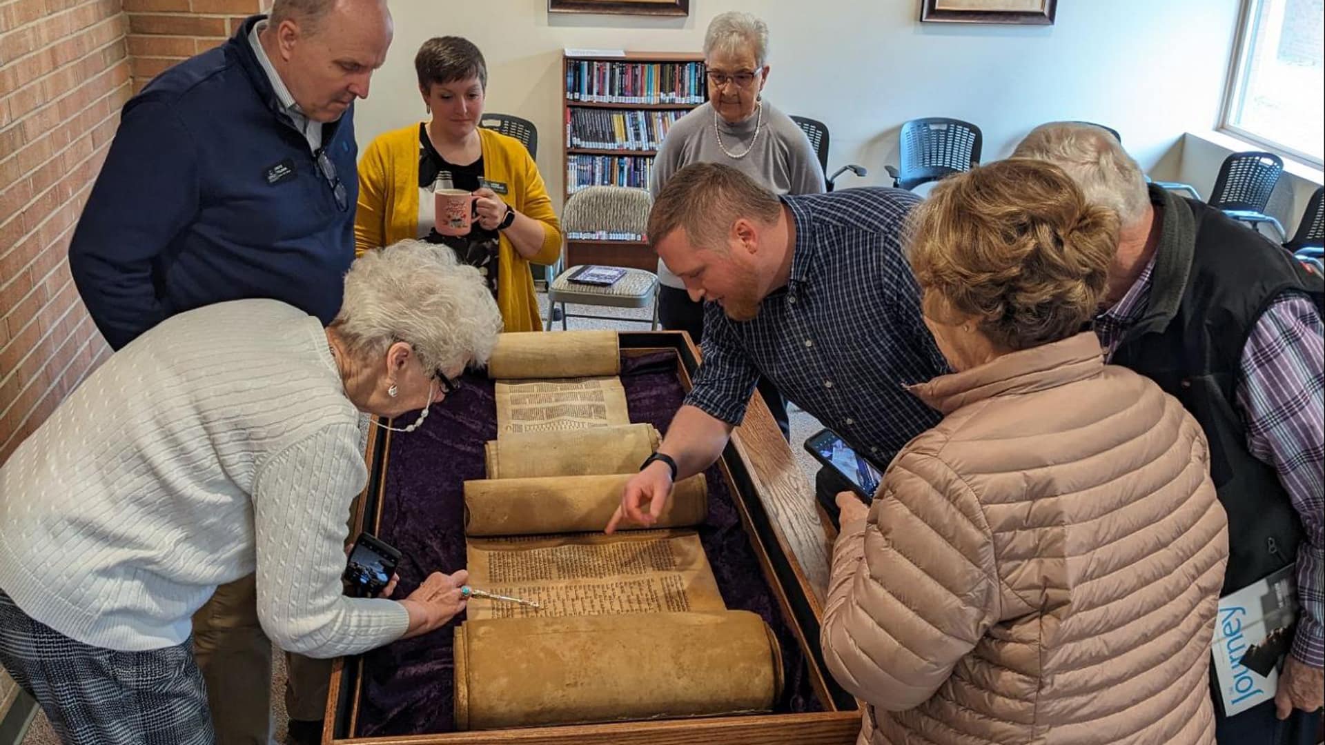 Torah student looking at the Torah