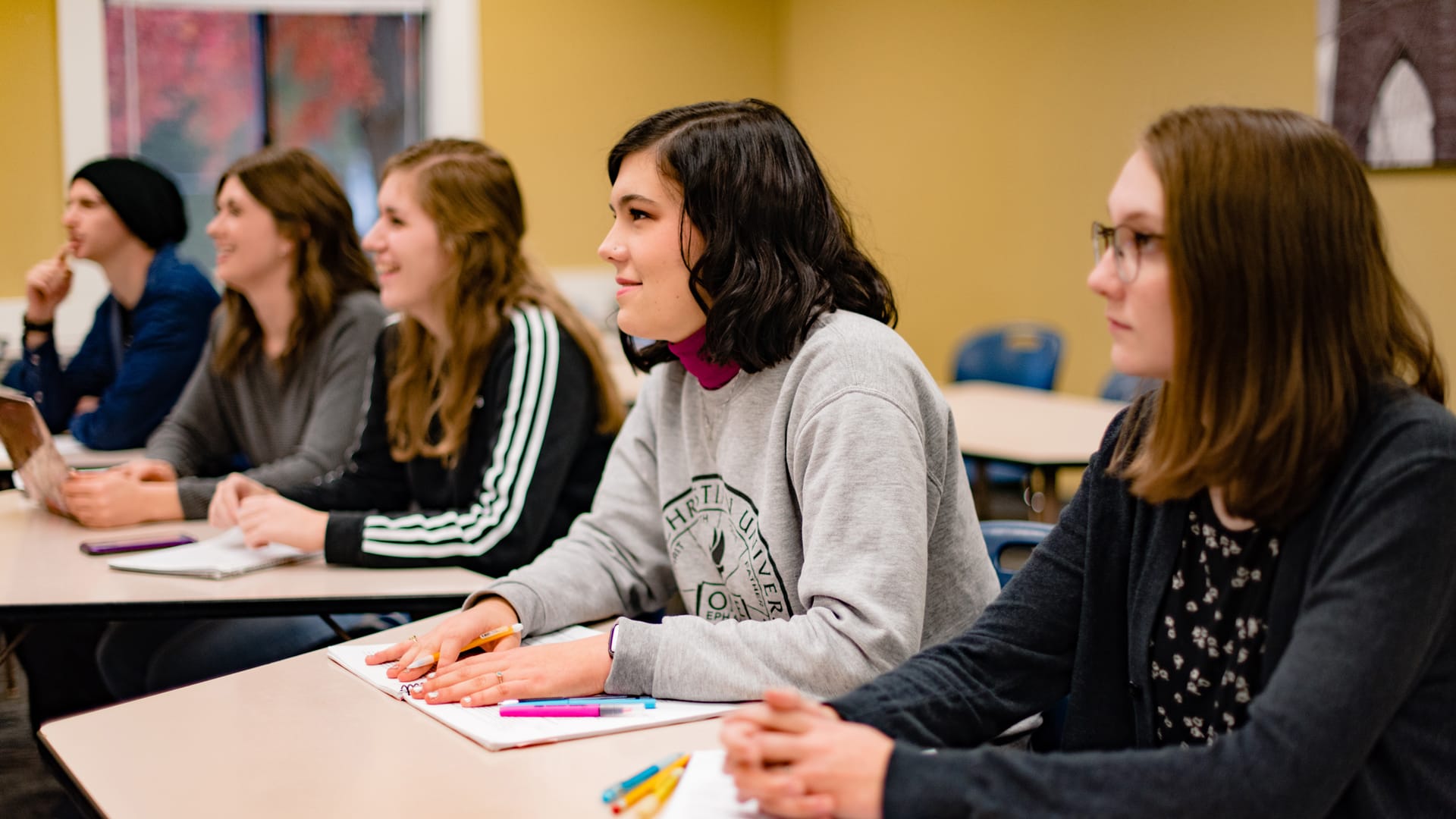 Academic-Calendar Grace On-Campus students in a classroom setting.