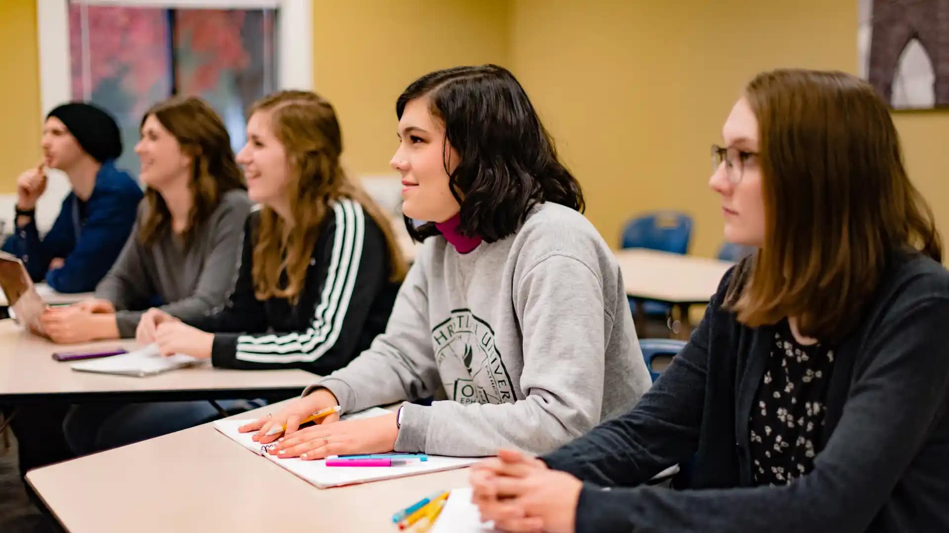 Academic-Calendar Grace On-Campus students in a classroom setting.