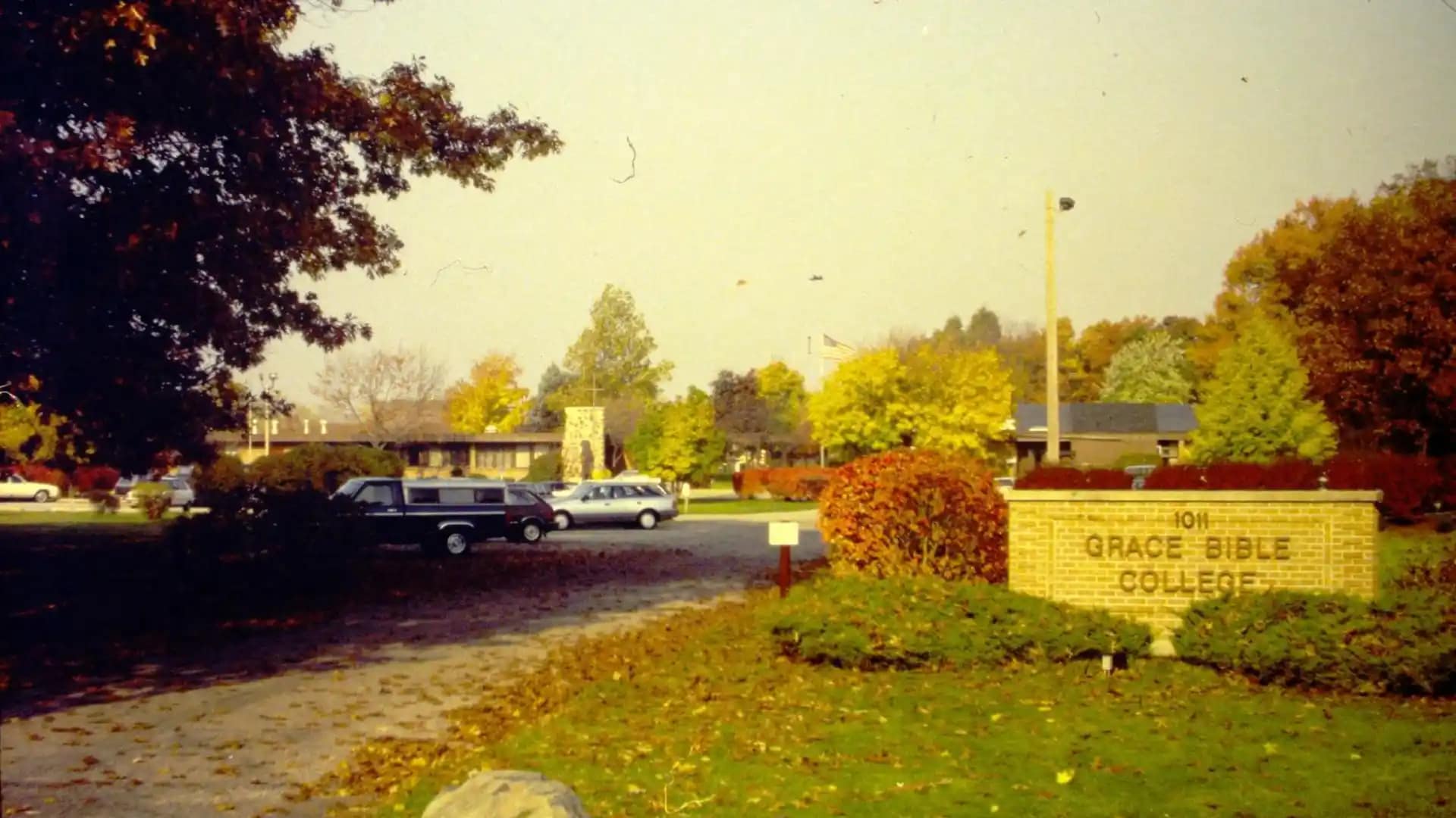 Grace-Bible-College-Entrance-Sign The main entrance of Grace Bible College showing the parking area and entrance sign.