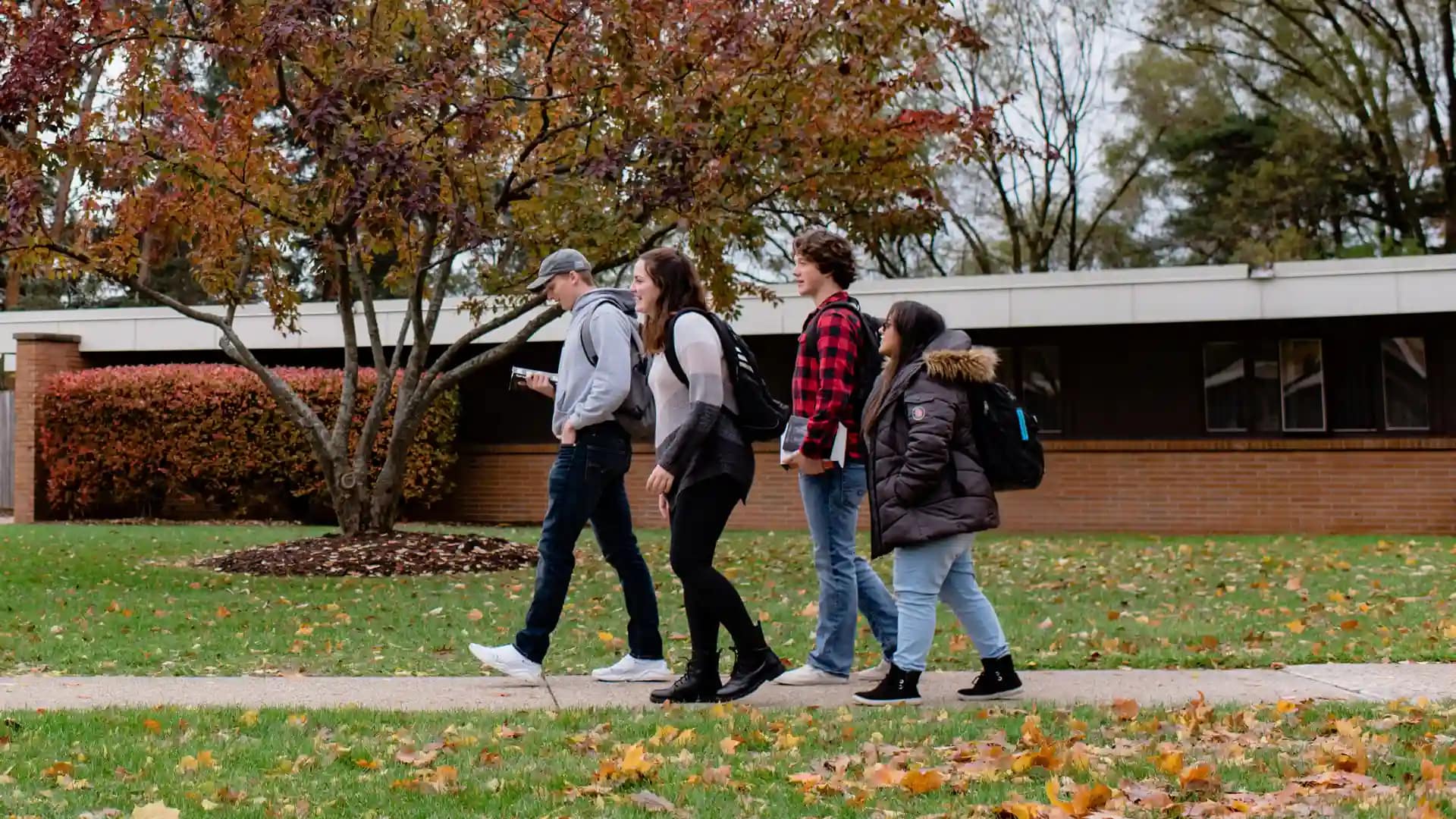 Scholarship-Visit A group of students walking around the Grace Campus.