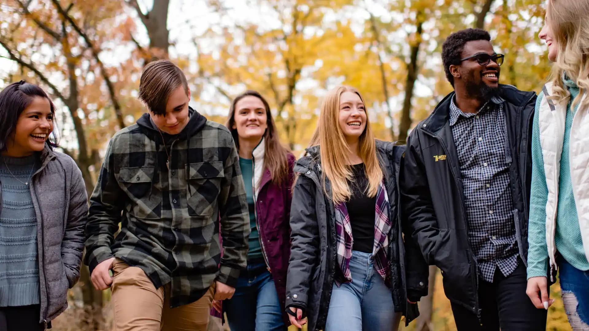 Student-Handbook Grace students outside in Fall