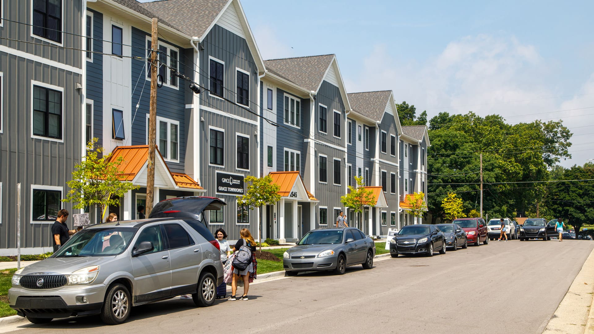 Housing-and-Dining Exterior view of the Grace Townhomes on a sunny day - one of the Housing options at Grace Christian University.