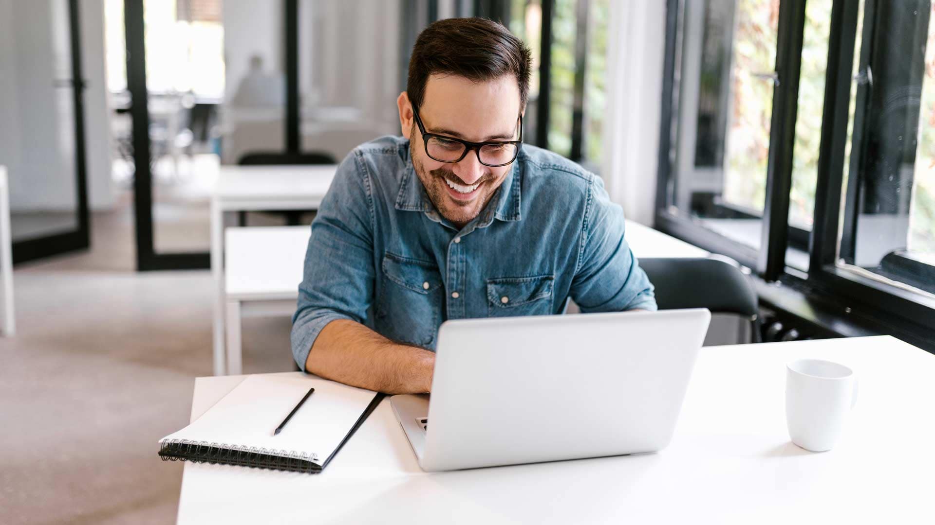 Grace-Online-Student-Laptop3 Grace Online students in a workspace working on a laptop