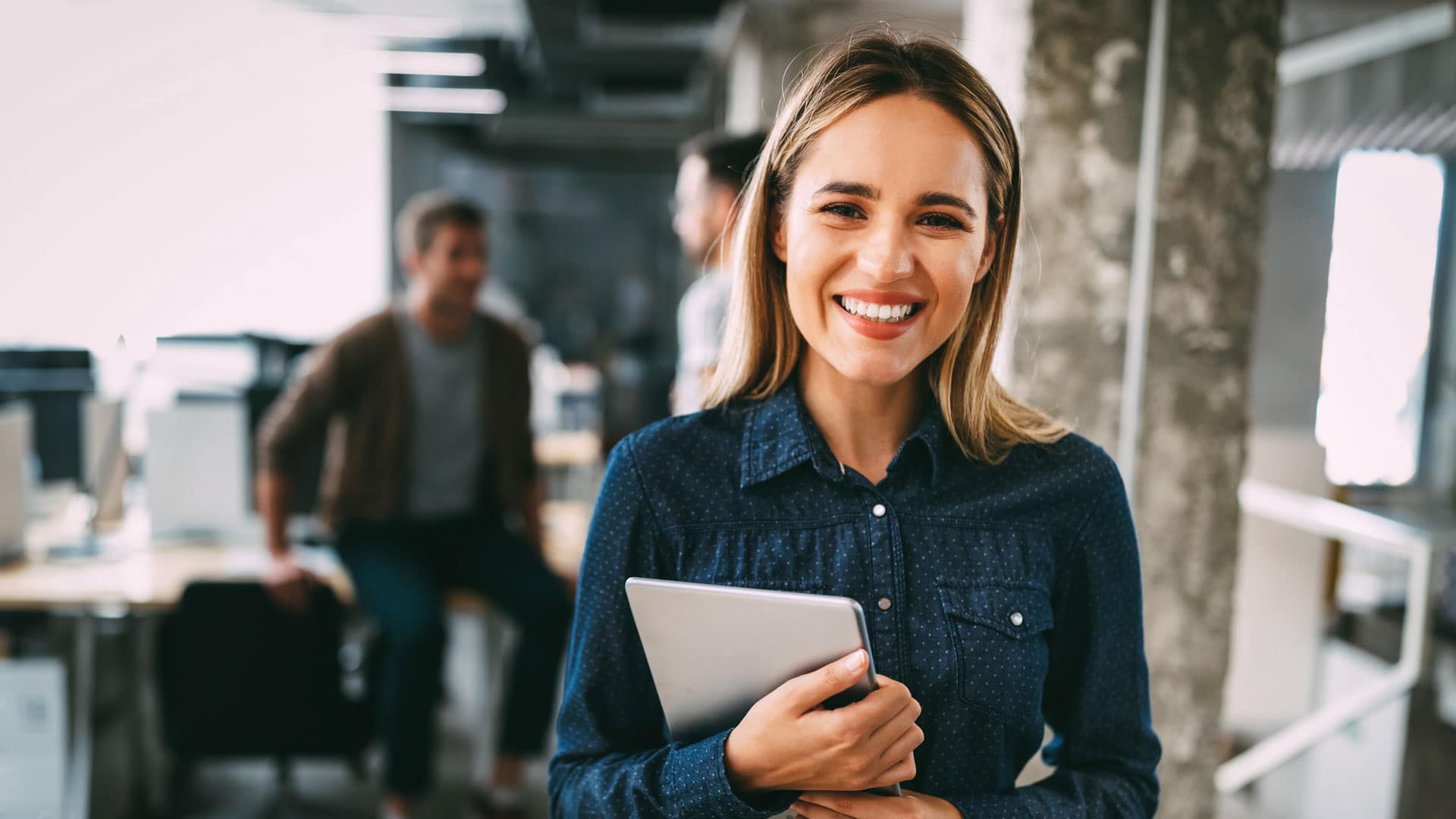 Online-Student-tablet2 Grace Online Business person with a tablet in a business office