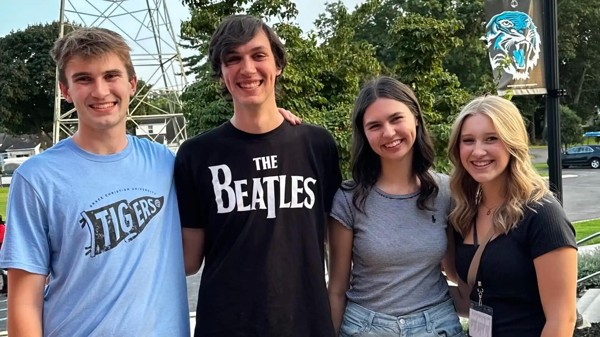 A group of Grace students outside on campus